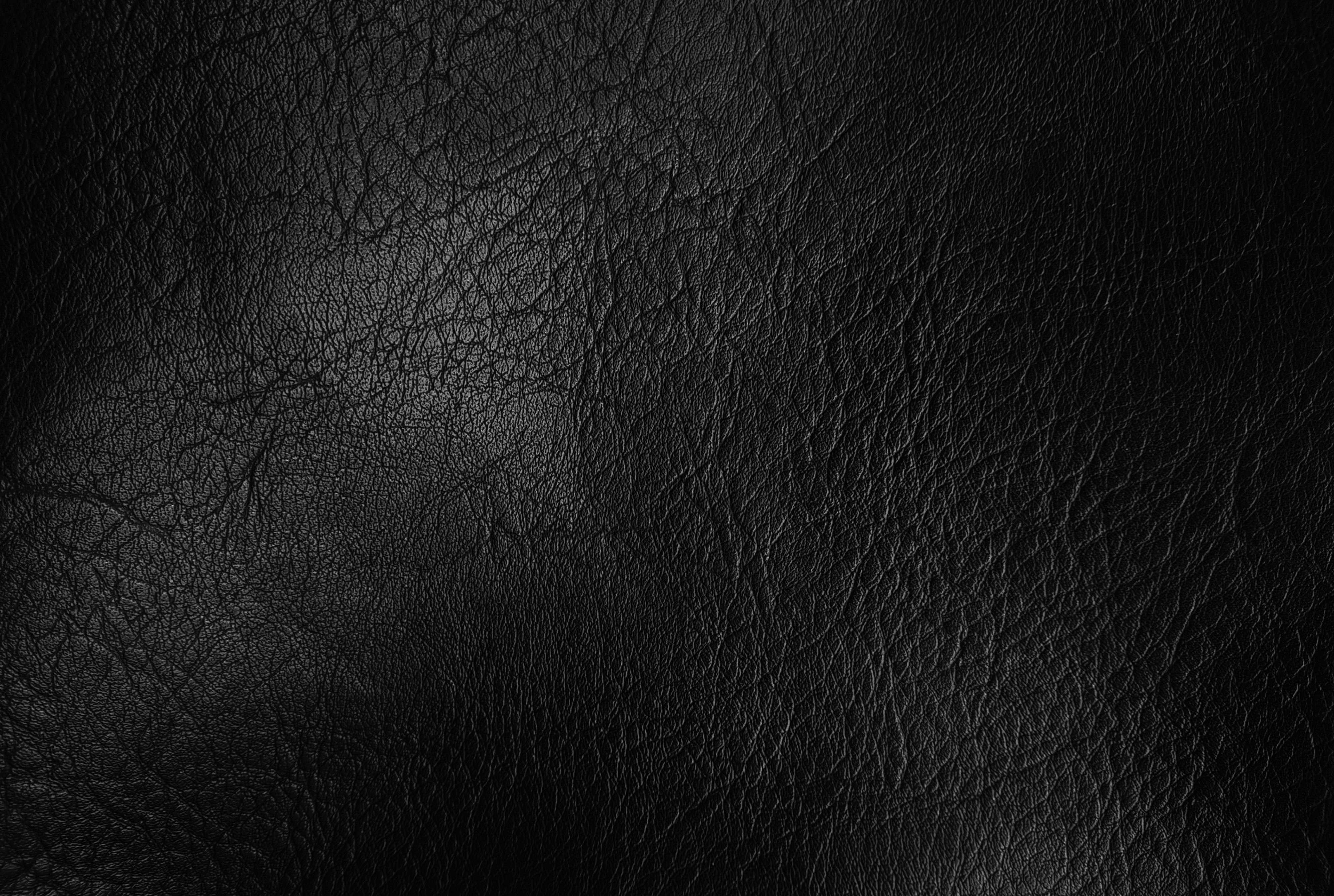Black gradient artificial leather texture background